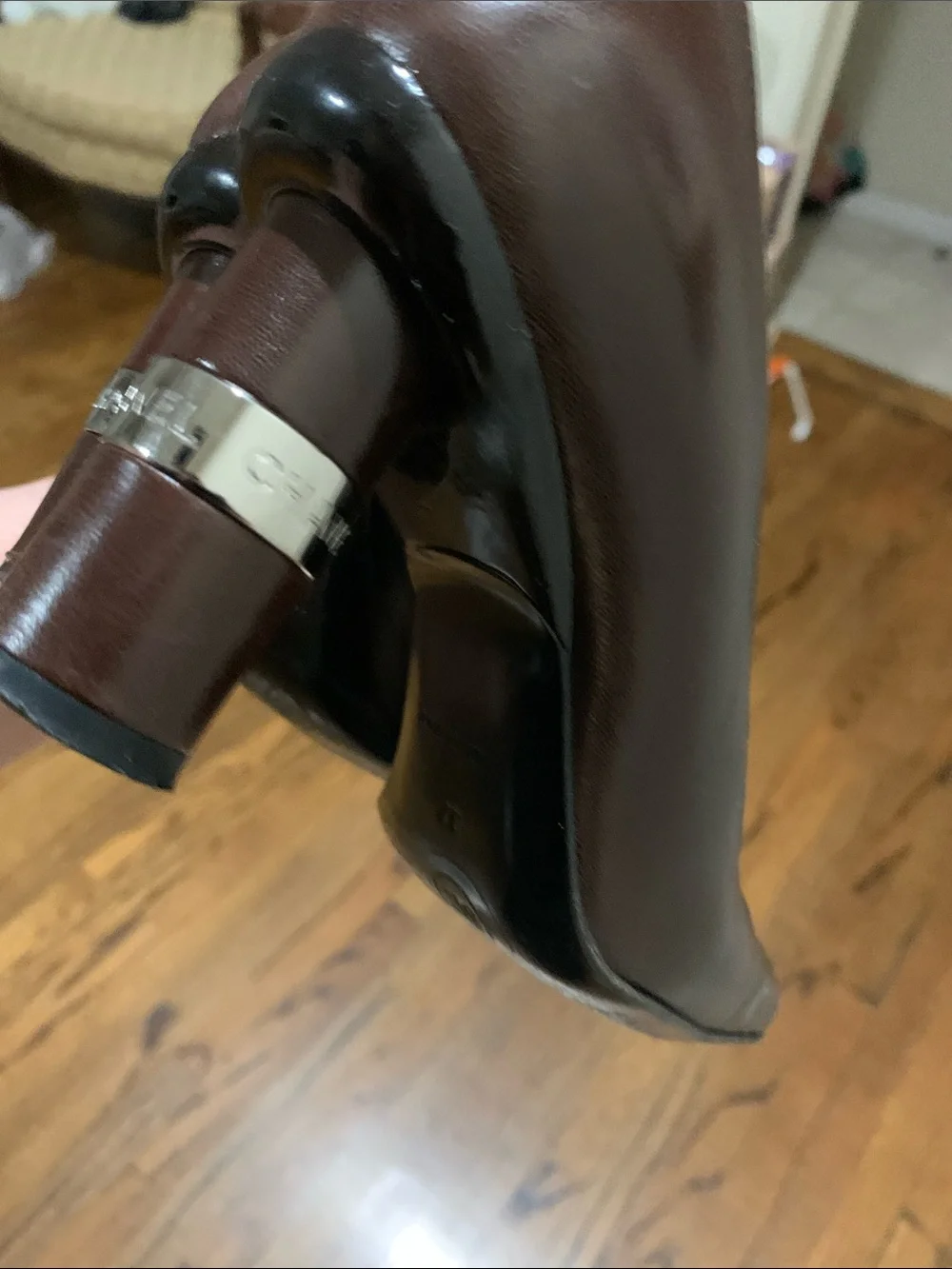CHANEL Brown Leather Low Heel Pumps with Black Toe Stripes